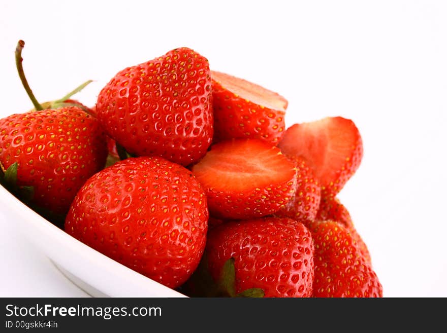 Bunch of red strawberries isolated over white. Bunch of red strawberries isolated over white