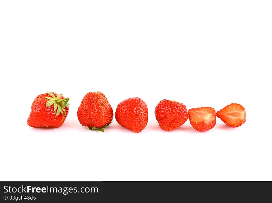 Bunch of red strawberries isolated over white. Bunch of red strawberries isolated over white