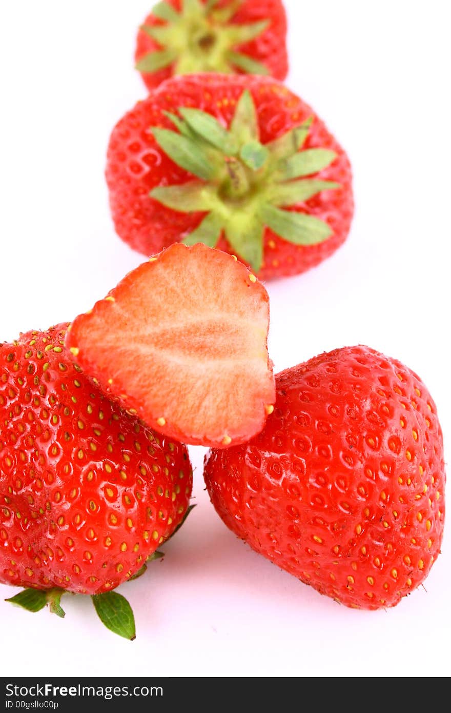 Bunch of red strawberries isolated over white. Bunch of red strawberries isolated over white