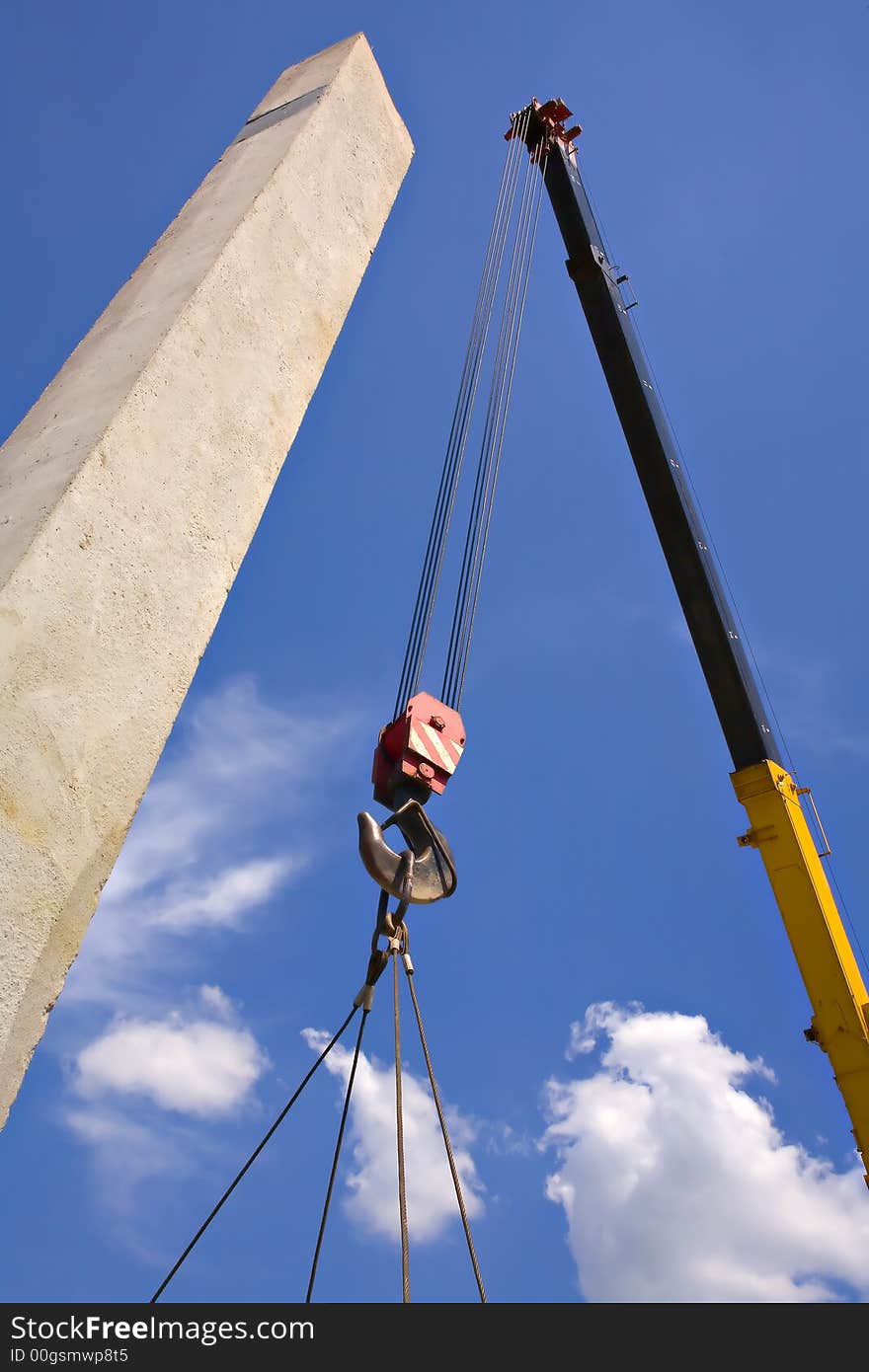 Hoisting crane on the sky. Hoisting crane on the sky