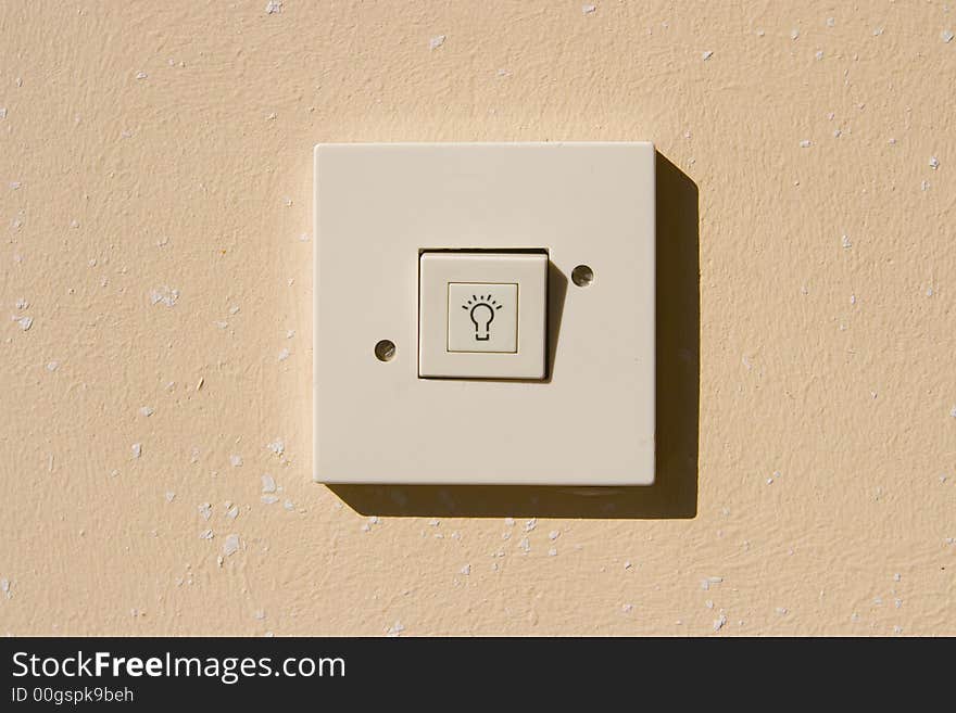 Traditional electrical switch on the wall