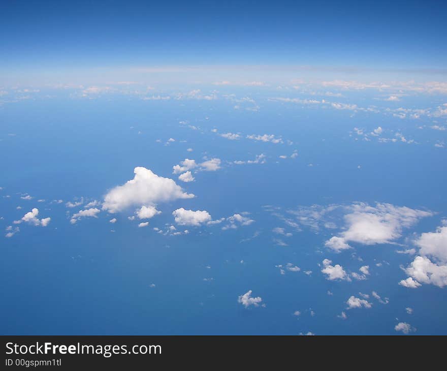 Flight view from an aeroplane above the clouds. Flight view from an aeroplane above the clouds