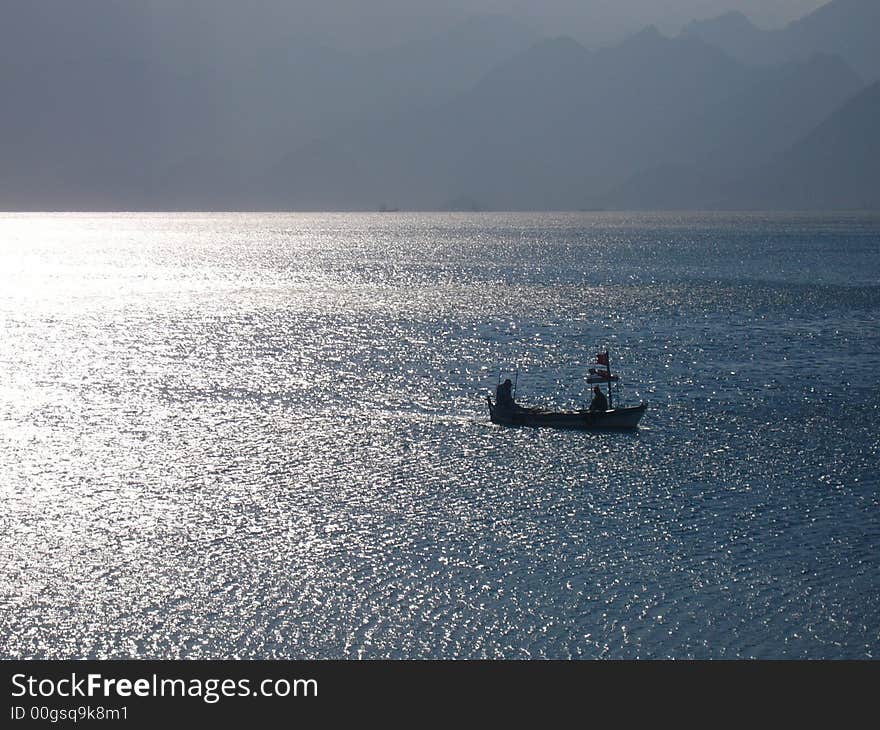 A turkish fishing boat heading for harbour. A turkish fishing boat heading for harbour