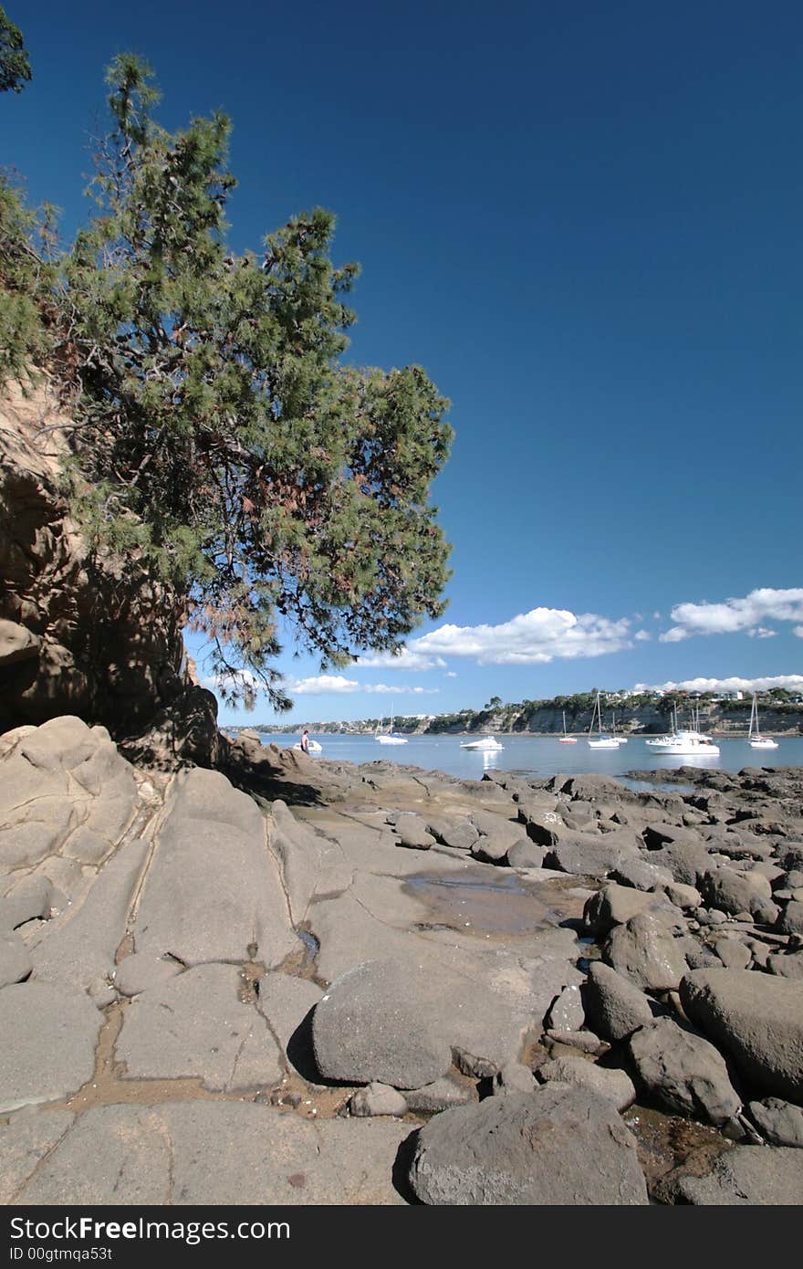 Jagged odd shaped rocks shaped by the water tides over the years. Jagged odd shaped rocks shaped by the water tides over the years