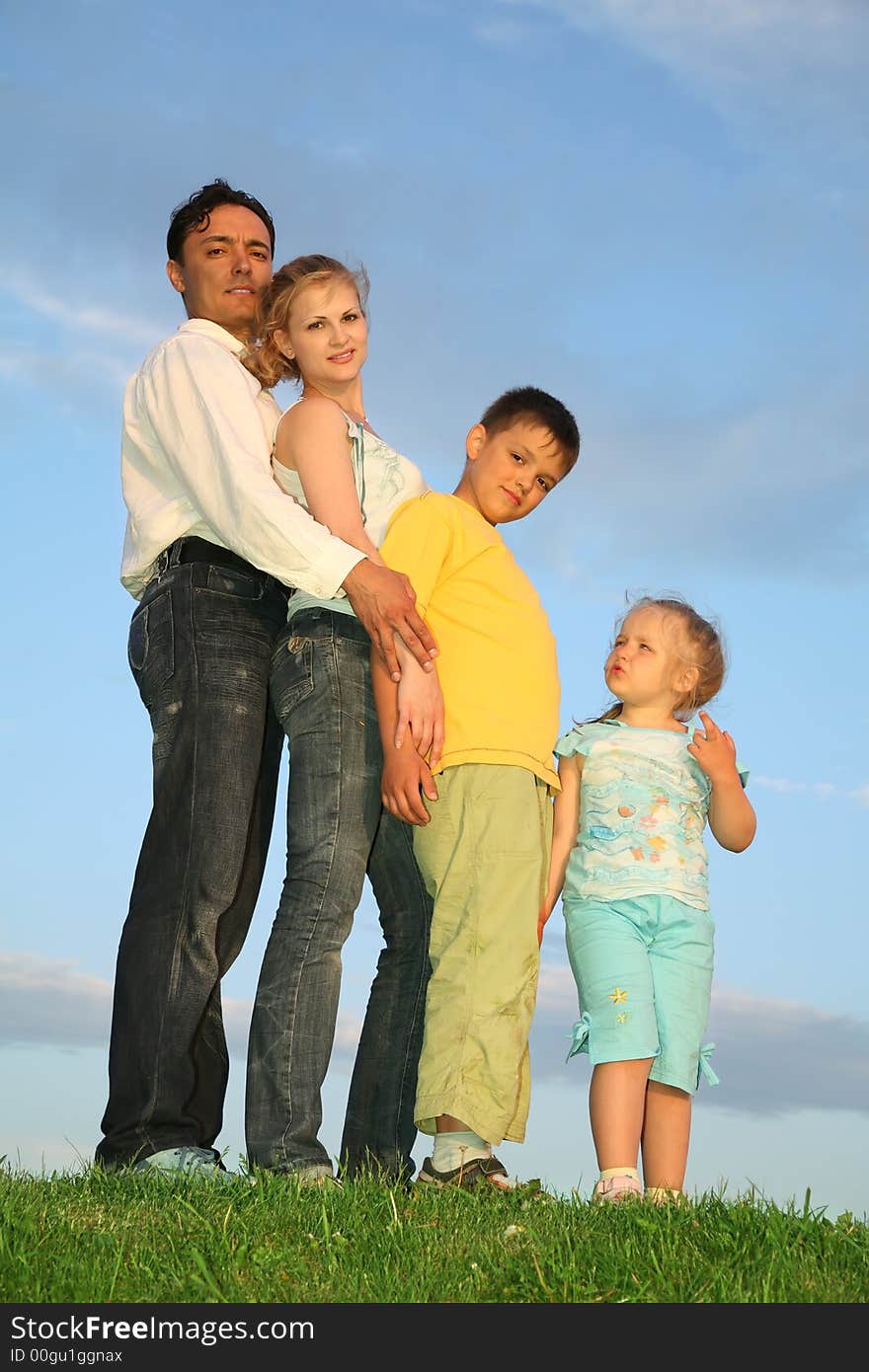 Family with two children against sky