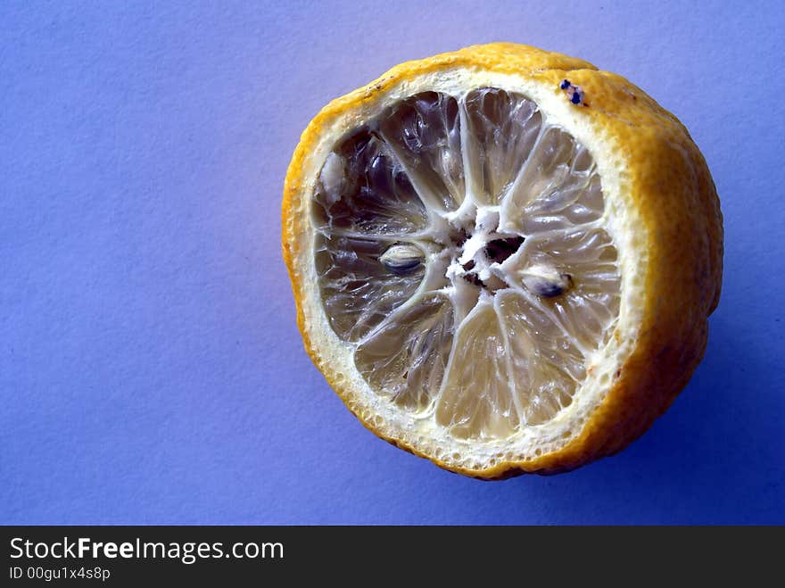 Bad lemon on a blue background. Bad lemon on a blue background.