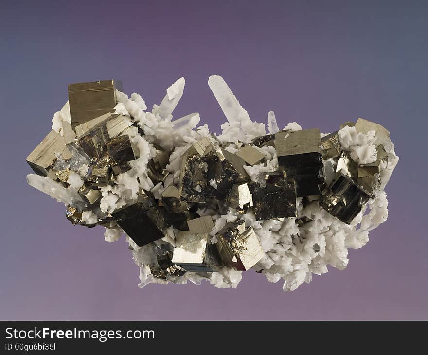 Close up of a pyrite, calcite and quartz mineral. Close up of a pyrite, calcite and quartz mineral.