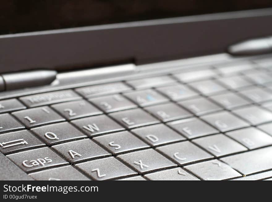 Close-up of open cellphone keyboard. Modern technology. Close-up of open cellphone keyboard. Modern technology