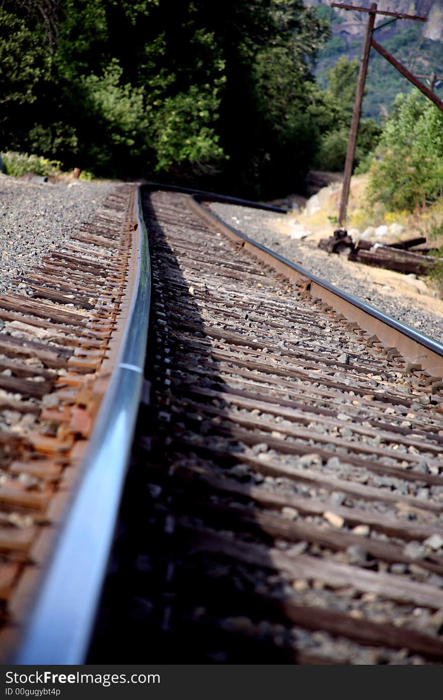Railroad Tracks Leading Around the Bend