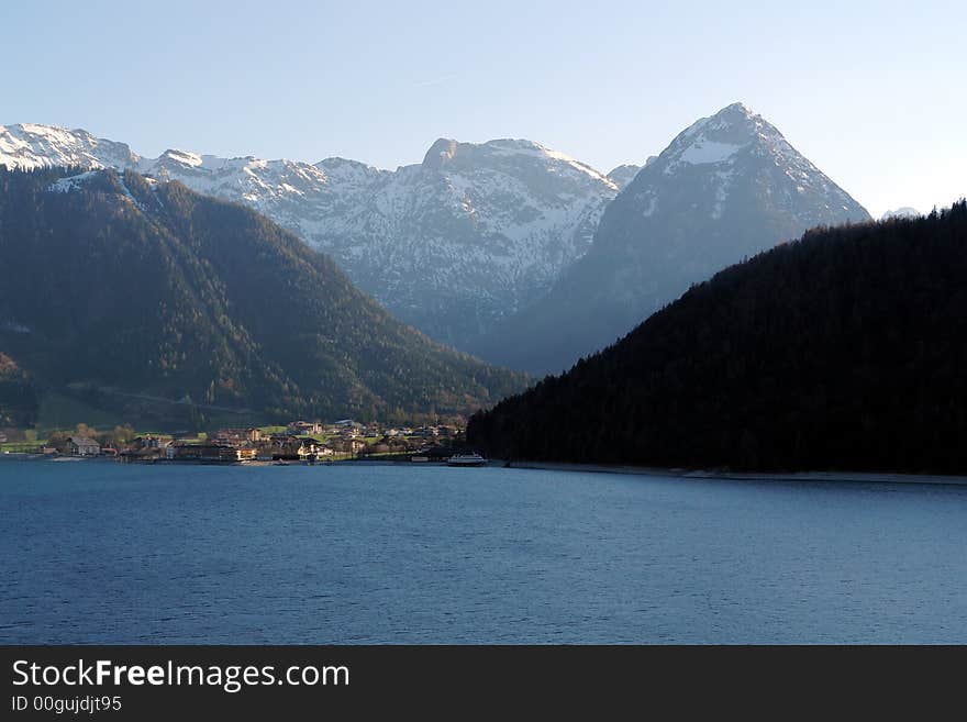 Achensee Austia , Lake in Alps , May 2007 . Small touristik town in another sid of the lake ,not so far from Innsbruck . Achensee Austia , Lake in Alps , May 2007 . Small touristik town in another sid of the lake ,not so far from Innsbruck .