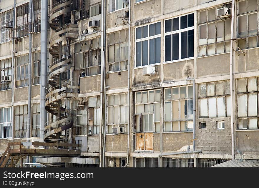 Very old indusrial building wall with fire escape stairs. Very old indusrial building wall with fire escape stairs