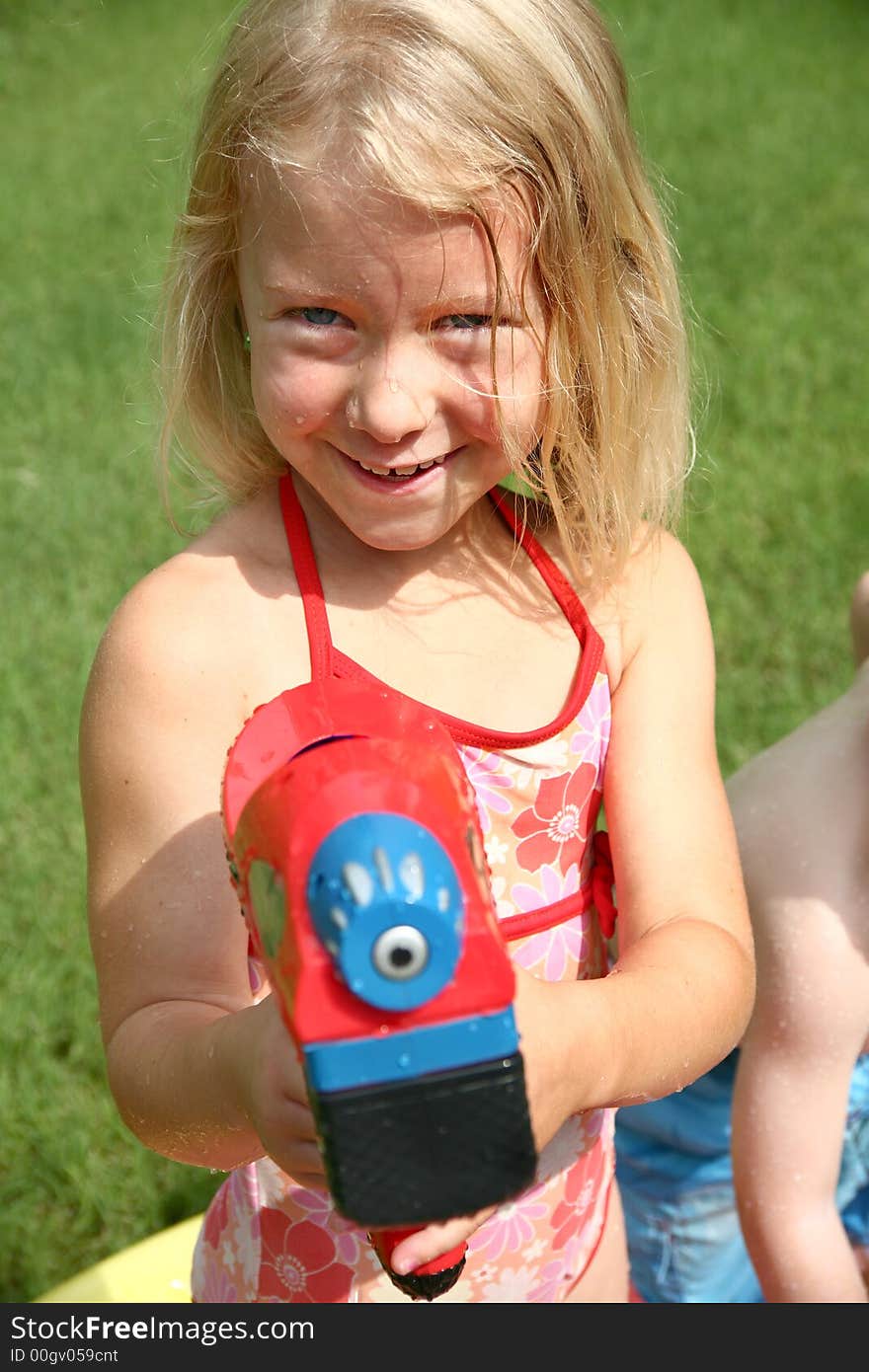 Beautiful Girl With Watergun