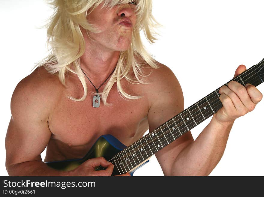 Man with long blonde hair playing guitar over white. Man with long blonde hair playing guitar over white.