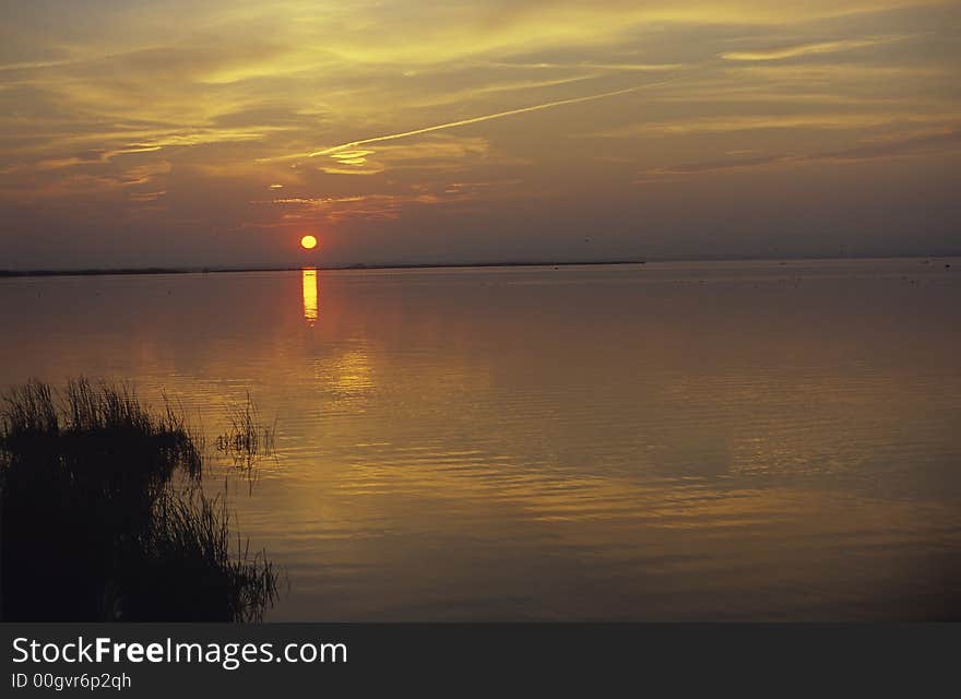 Sunset in La Albufera near the village of El Palmar close to the city of Valencia, Spain. Sunset in La Albufera near the village of El Palmar close to the city of Valencia, Spain