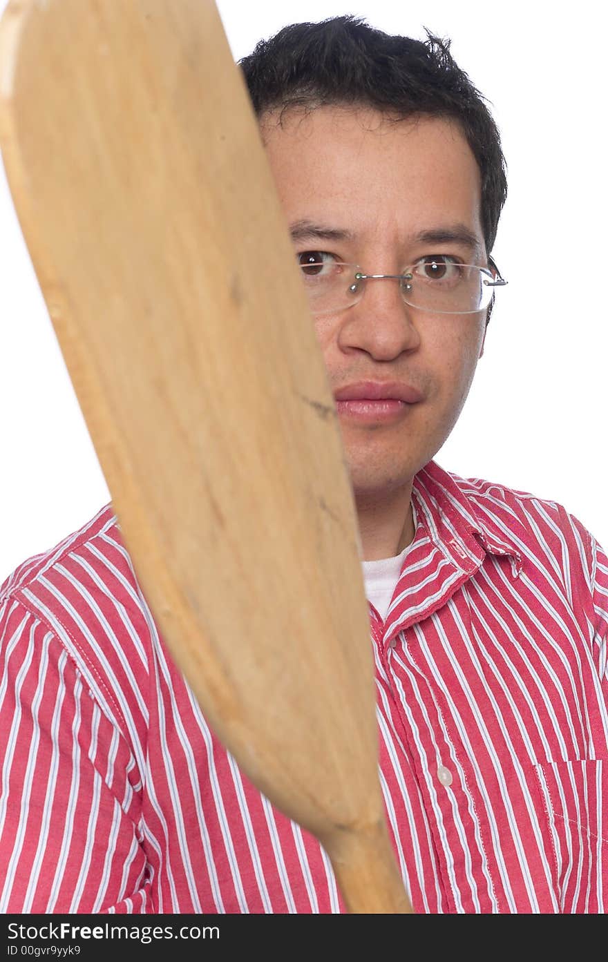 Close up portrait of Latino man against a white background waiving an Oar. Close up portrait of Latino man against a white background waiving an Oar