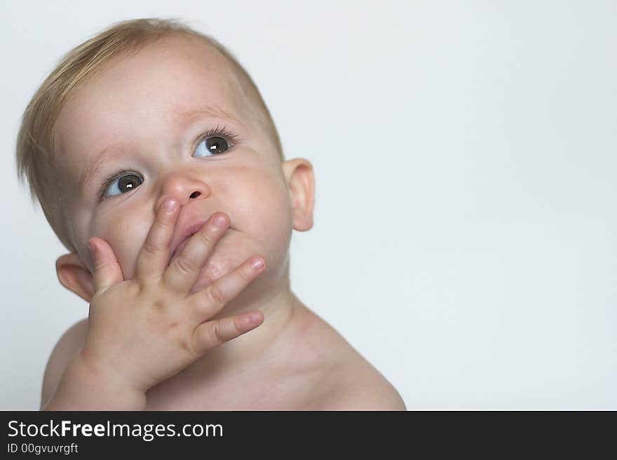 Image of a cute toddler blowing kisses