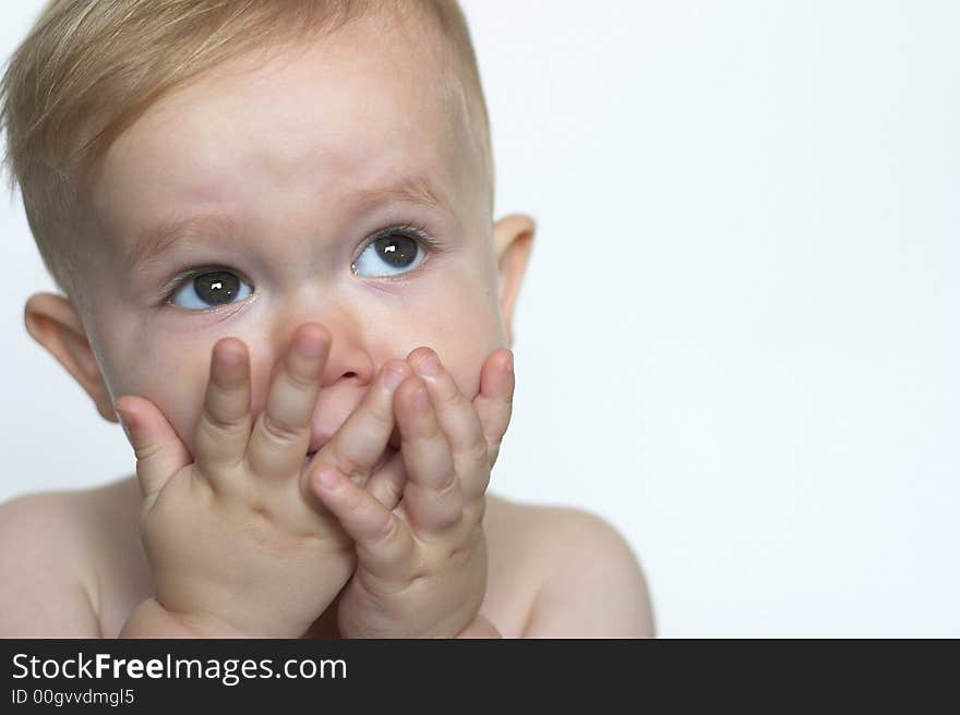 Image of a cute toddler blowing kisses