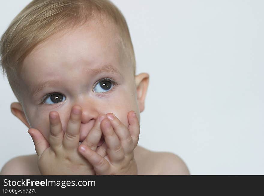 Image of a cute toddler blowing kisses