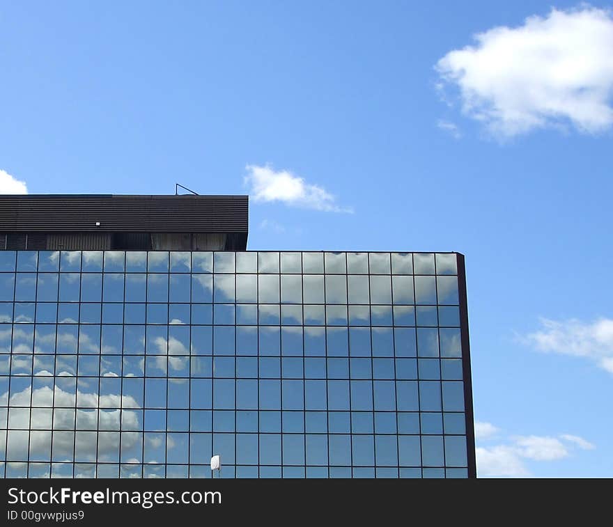 Clouds Over Mirrored Building