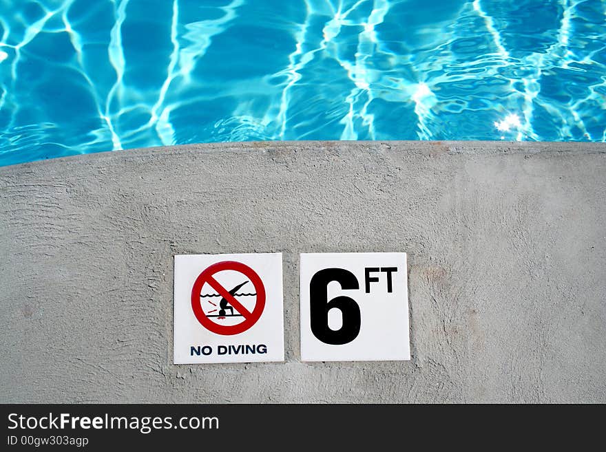 Swimming pool depth marker