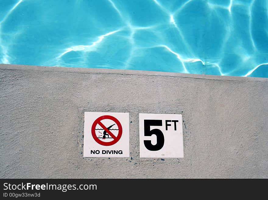 Swimming pool depth marker