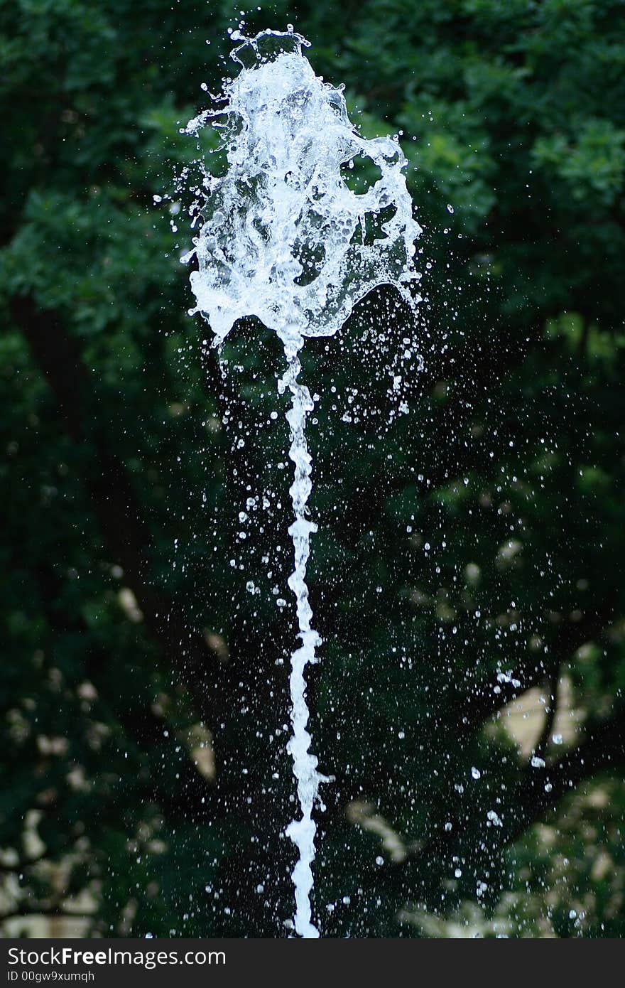 Fragment of fountain water drops in the air