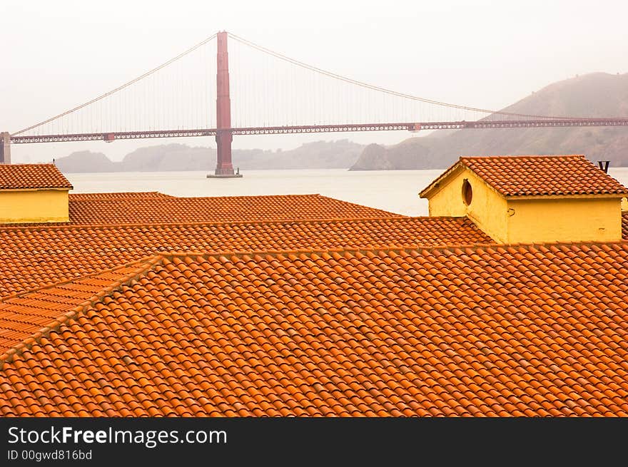 Golden Gate Bridge, viewed across the red tile roofs of Fort Mason. Golden Gate Bridge, viewed across the red tile roofs of Fort Mason.