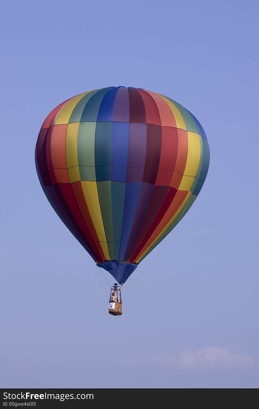 Here is a colorful hot air balloon floating in the air. Here is a colorful hot air balloon floating in the air