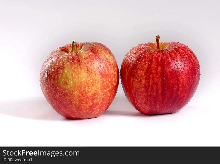 Fullview of fresh couple apple on the white background