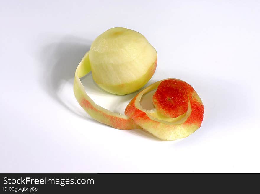 Fullview of fresh apple with its peel on the white background