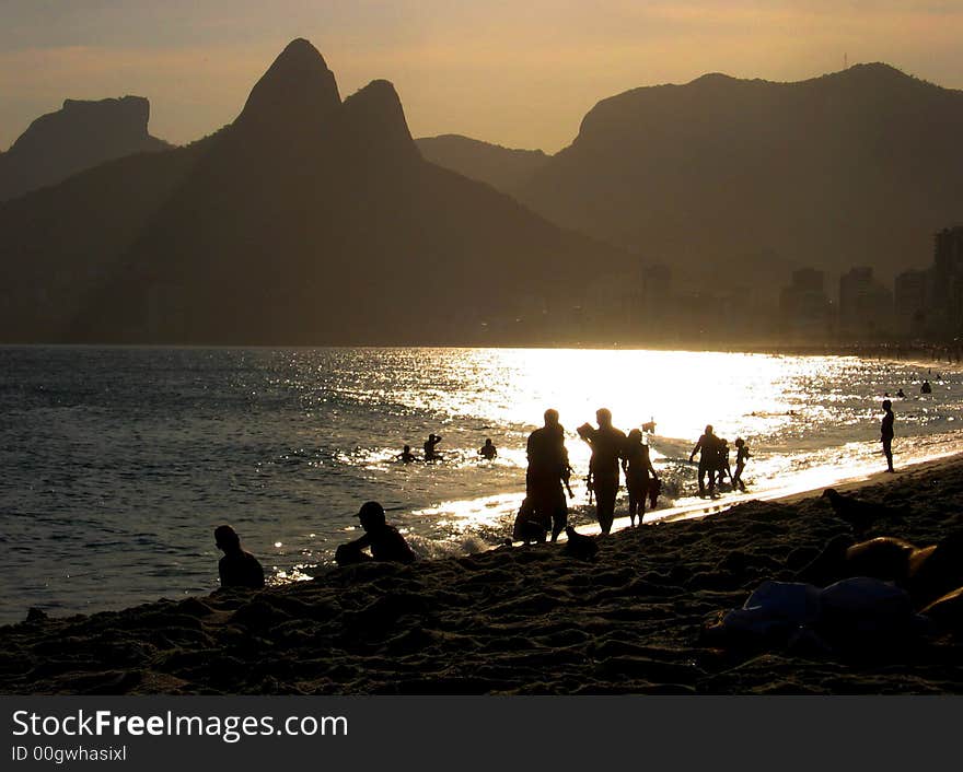 Relaxing and walking along the beach during sunset. Relaxing and walking along the beach during sunset