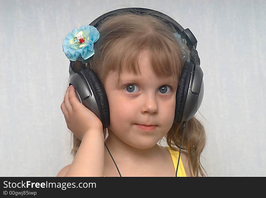 An image of girl listening to music. An image of girl listening to music