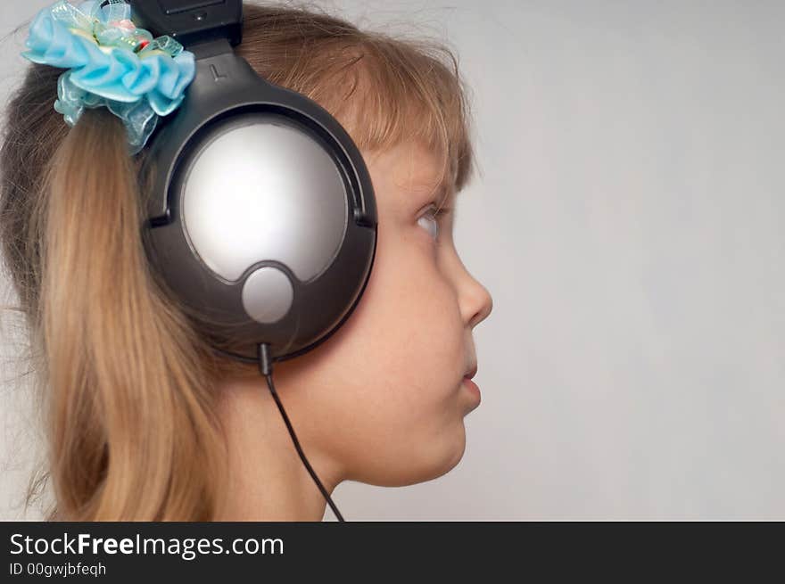 An image of girl listening to music. An image of girl listening to music