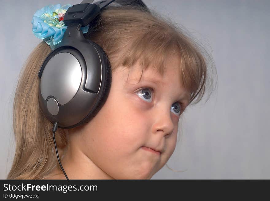 An image of girl listening to music. An image of girl listening to music