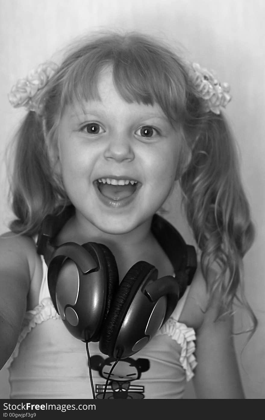 An image of girl listening to music. An image of girl listening to music