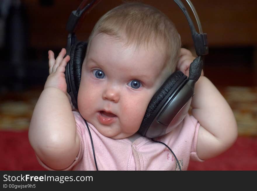 An image of girl listening to music