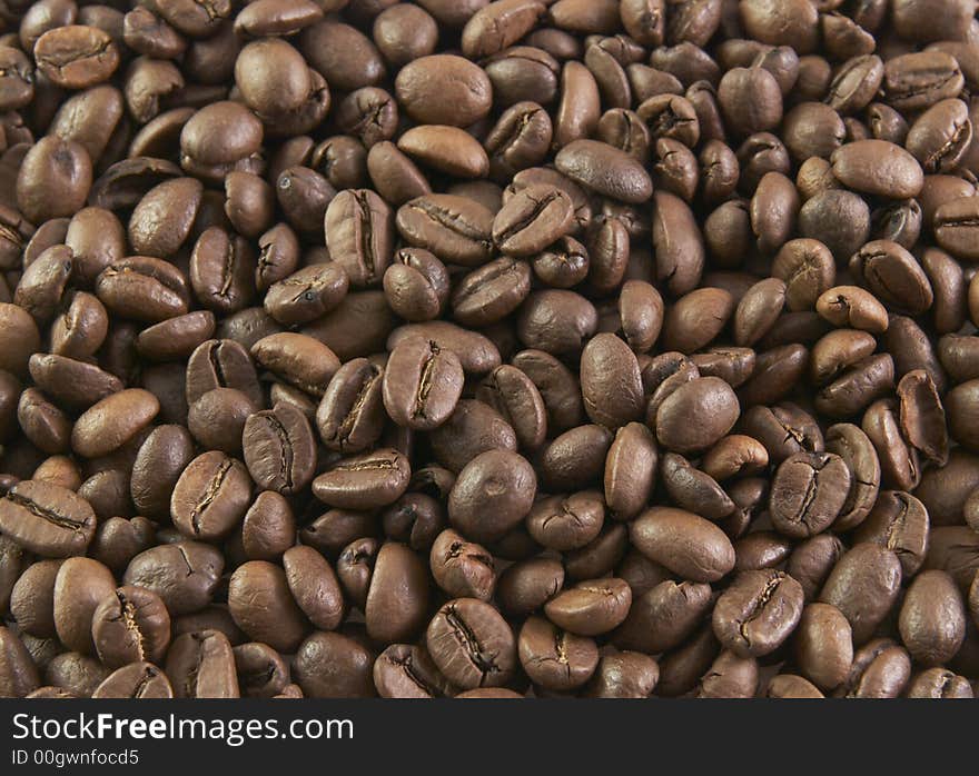 Aromatic brown coffee grains for background