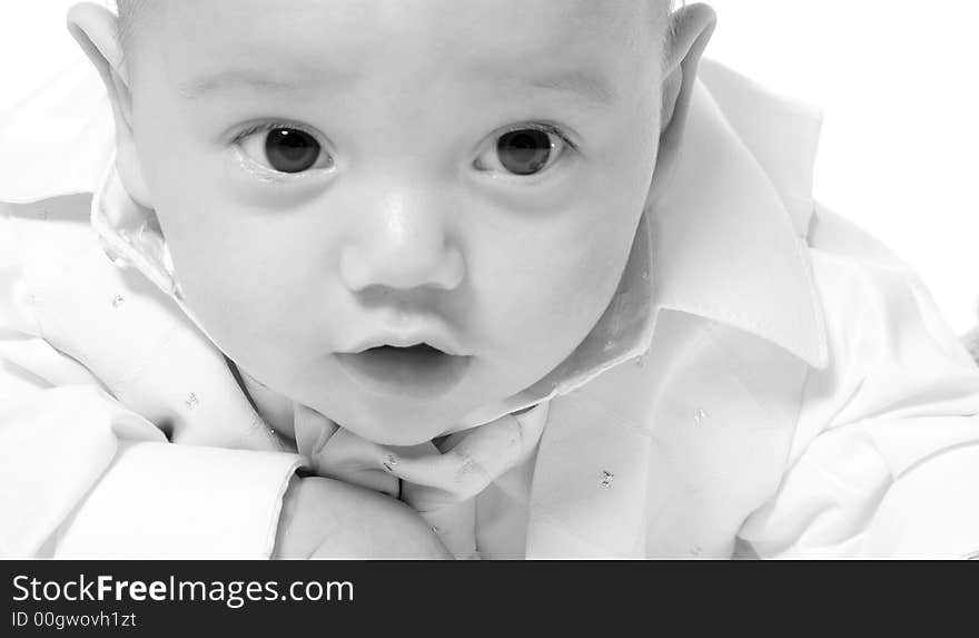 Little children portraits taken in the studio on a white background. Little children portraits taken in the studio on a white background