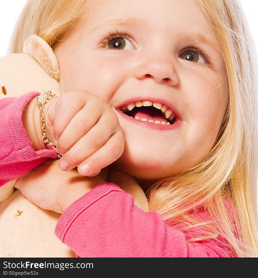 Little children portraits taken in the studio on a white background. Little children portraits taken in the studio on a white background