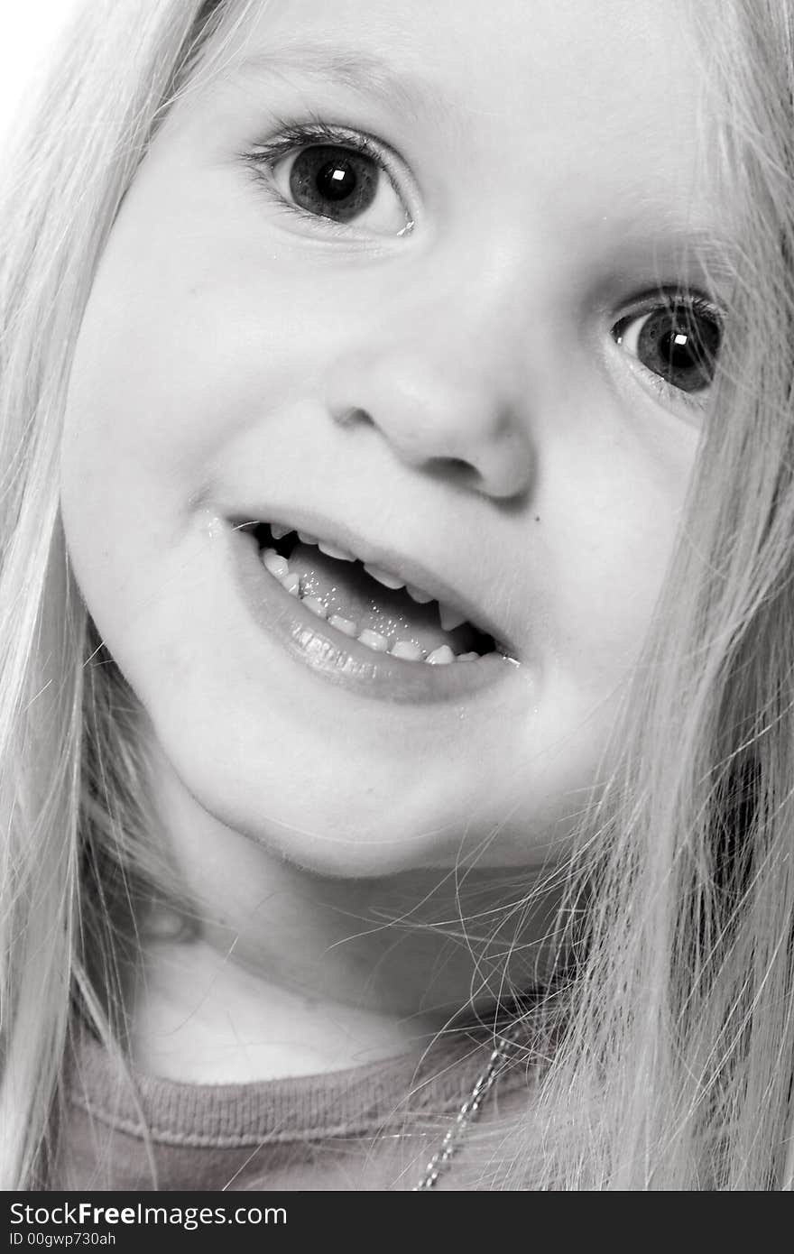 Little children portraits taken in the studio on a white background. Little children portraits taken in the studio on a white background