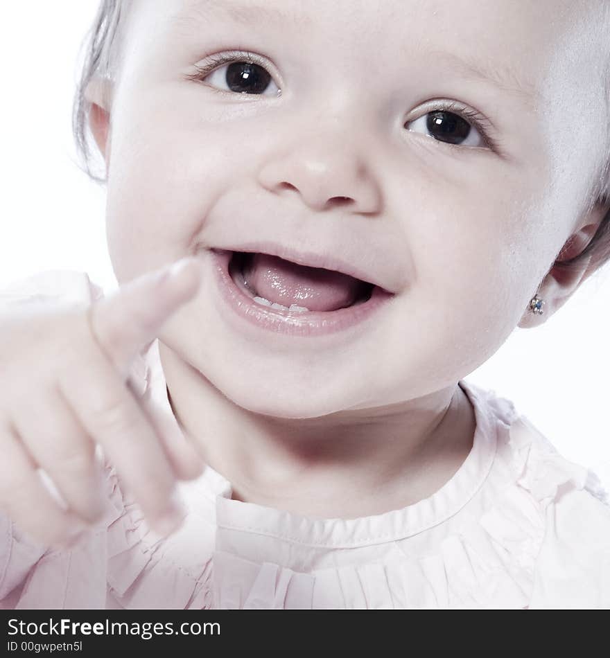 Little children portraits taken in the studio on a white background. Little children portraits taken in the studio on a white background