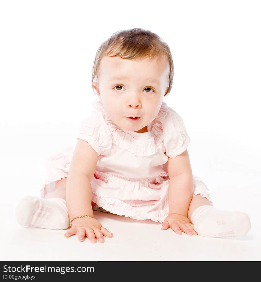 Little children portraits taken in the studio on a white background. Little children portraits taken in the studio on a white background