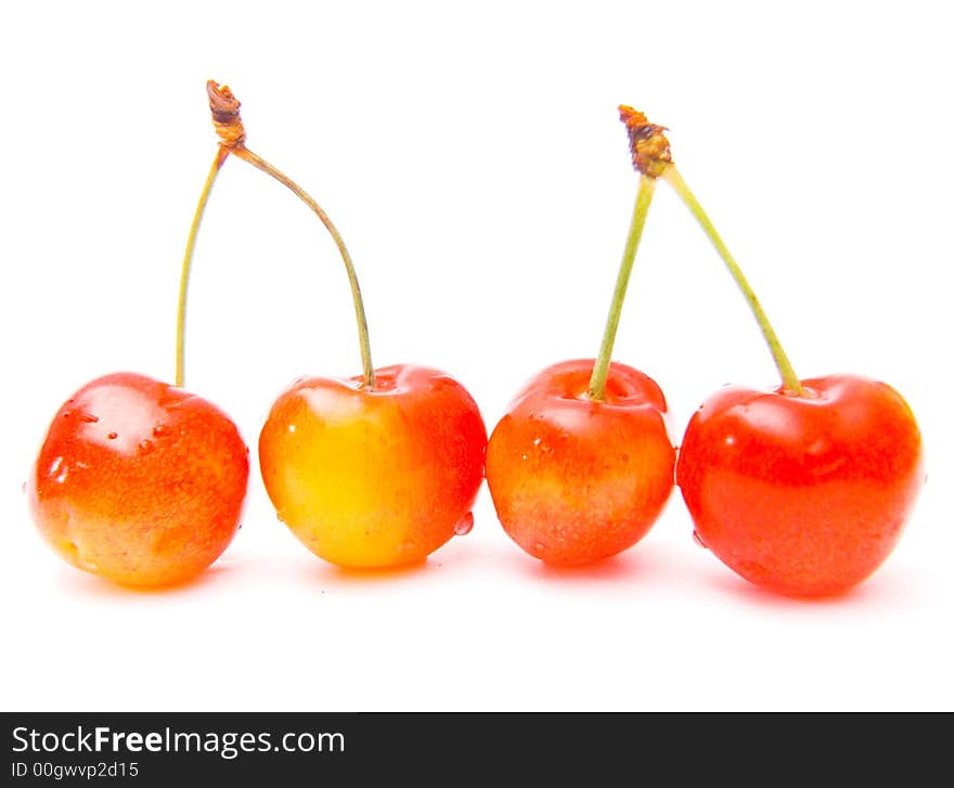 Fresh cherries isolated over white background