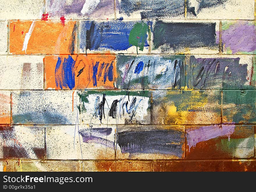 Cement brick wall painted with many colors. Cement brick wall painted with many colors