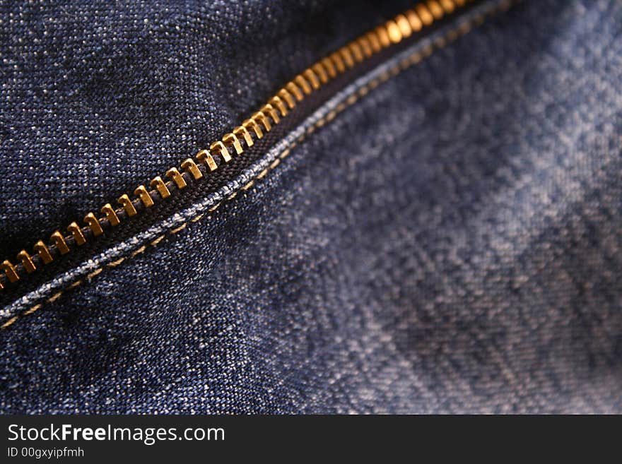 Closeup a yellow bluejeans zipper