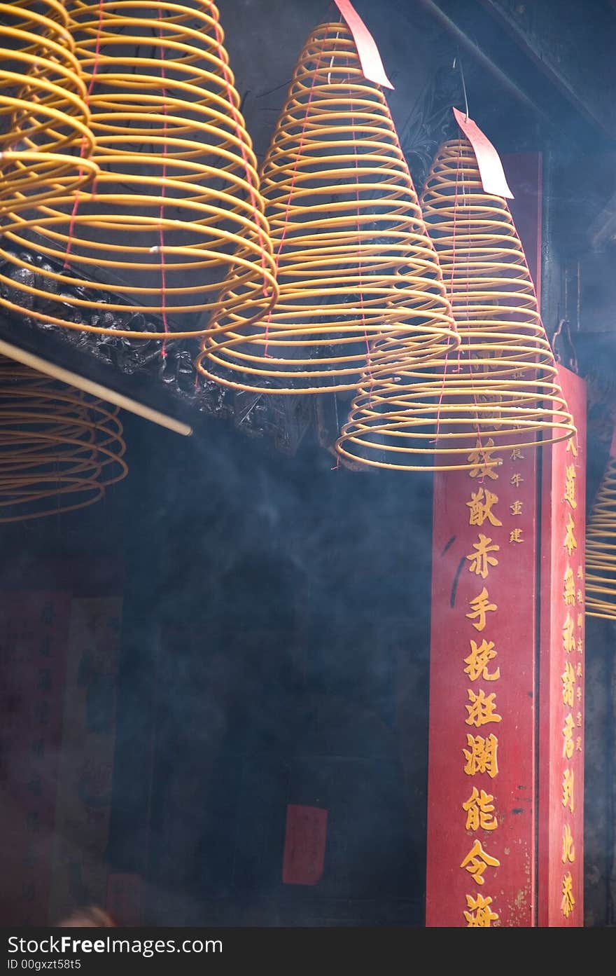 Hanging incense coils burning in a temple in Hong Kong