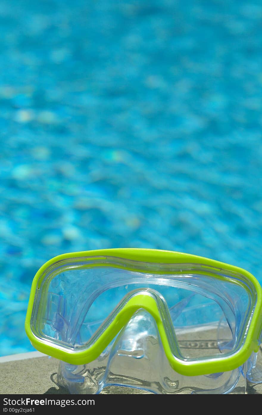 Water mask on ground by pool. Water mask on ground by pool