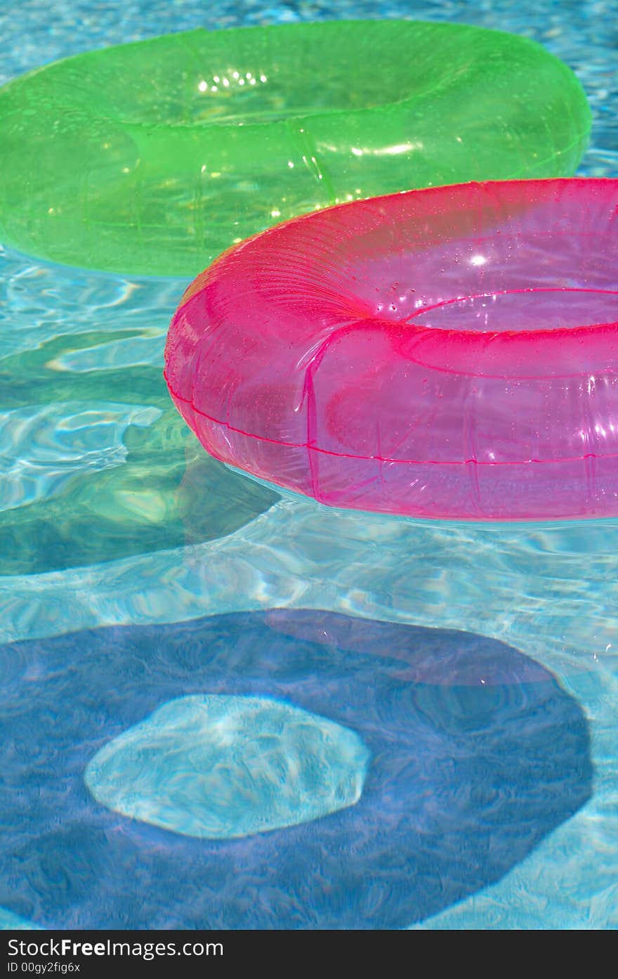 Round float in pool of water. Round float in pool of water