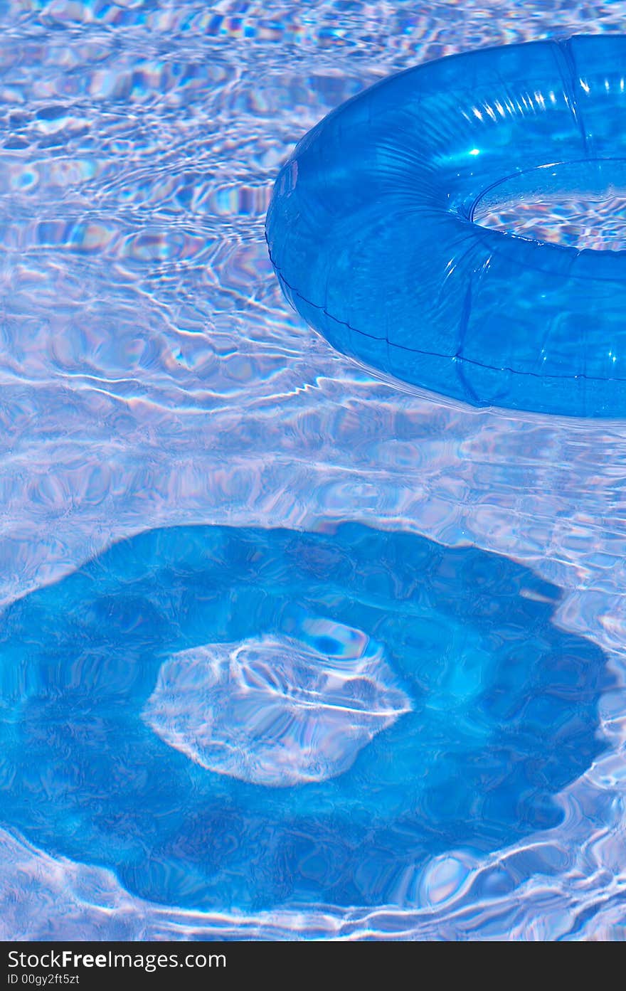 Round float in pool of water. Round float in pool of water