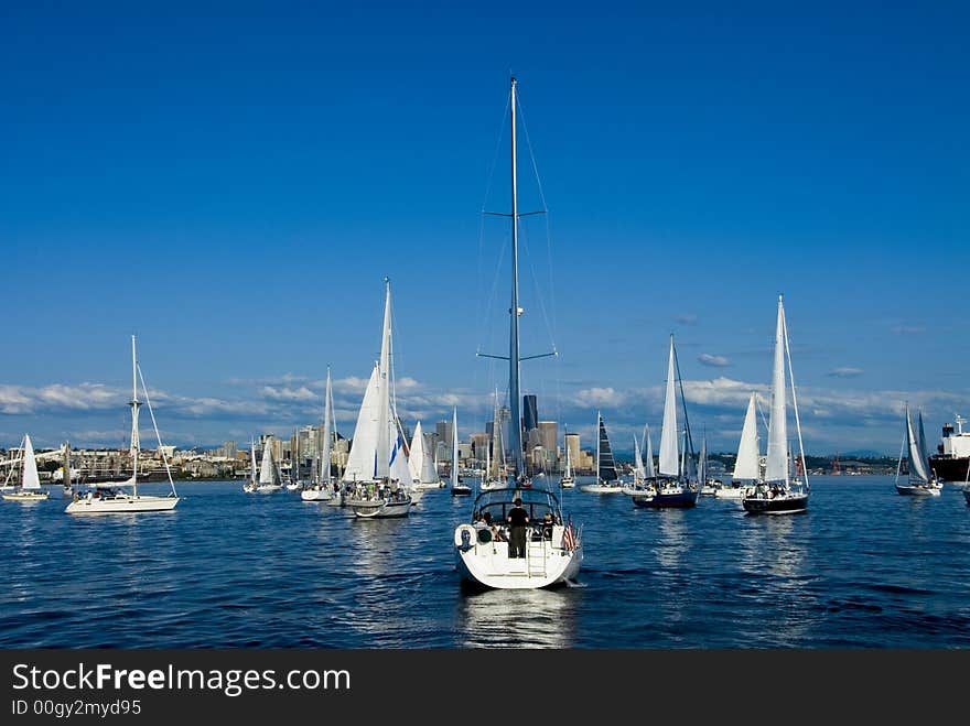 Sailboats on Elliott Bay in downtown Seattle, WA. Sailboats on Elliott Bay in downtown Seattle, WA